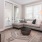 roomy living room with large windows, plush carpet, and is next to kitchen