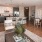 spacious living area next to dining room and kitchen